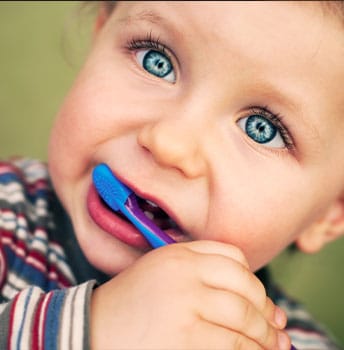 Baby Brushing teeth at Around the World Pediatric Dentistry 2
